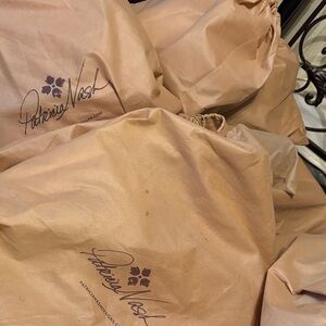 Dust Bags come with purse of purchase!